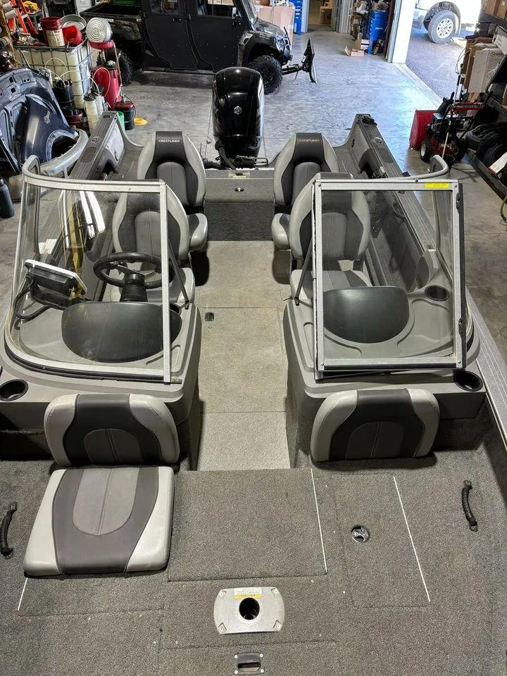 Slide: The Image of 2016 Crestliner 1750 Super Hawk boat interior with dual consoles and seating. - 6