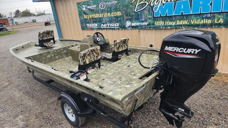 Slide: The Image of 2025 Tracker GRIZZLY® 1754 SC boat with Mercury engine, camo seats, on trailer. - 5