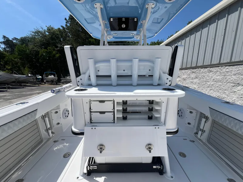 Slide: The Image of 2024 Blackfin 252 CC center console boat with rod holders and storage compartments. - 15