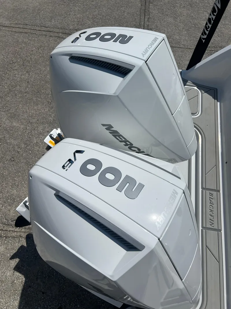 Slide: The Image of 2024 Blackfin 252 CC boat with twin Mercury outboard engines. - 20