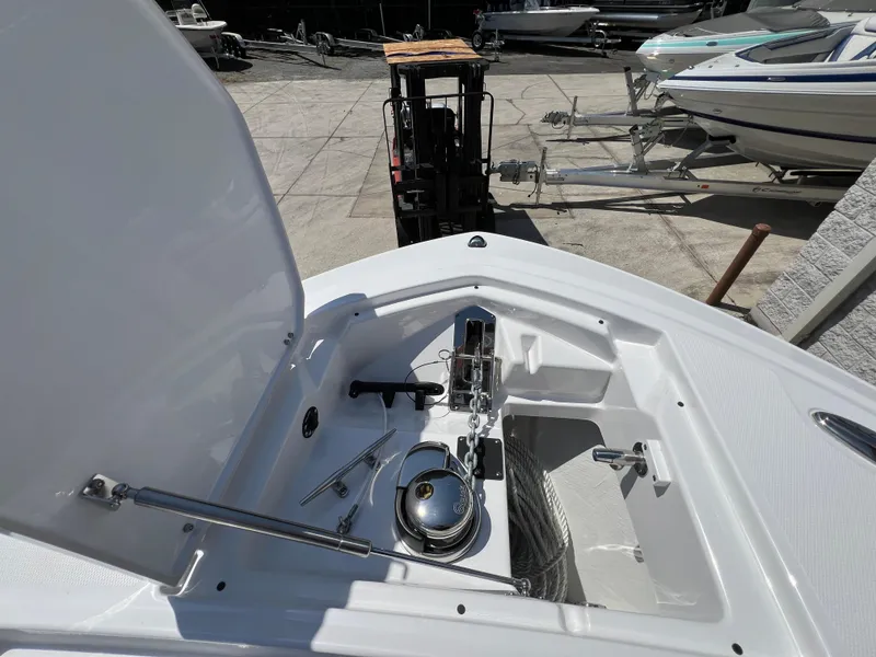 Slide: The Image of 2024 Blackfin 252 CC boat anchor storage compartment. - 22