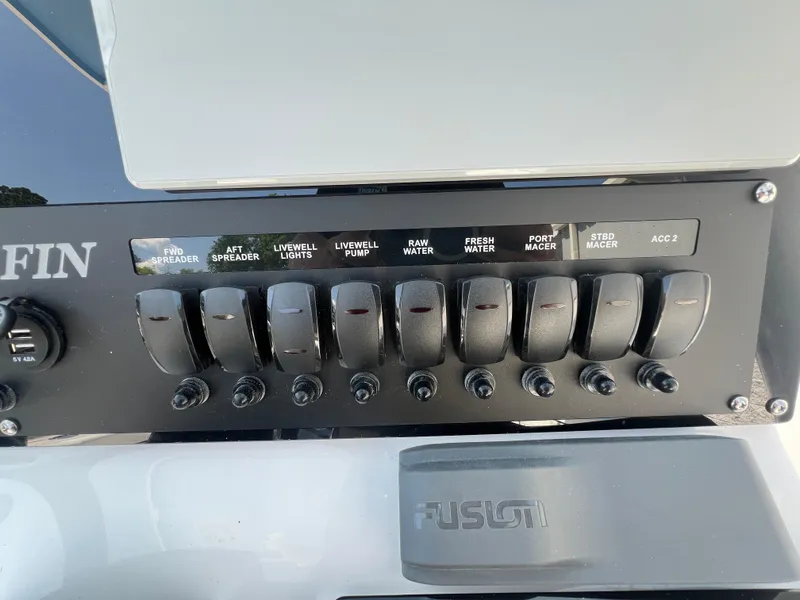 Slide: The Image of Control panel of a 2024 Blackfin 252 CC boat with labeled switches. - 29