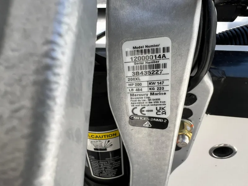 Slide: The Image of 2024 Blackfin 252 CC Mercury Marine engine label with model and serial numbers. - 49