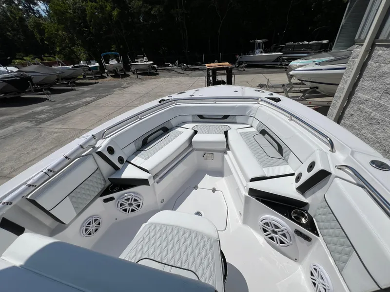 Slide: The Image of 2024 Blackfin 252 CC boat with spacious seating and modern design. - 5