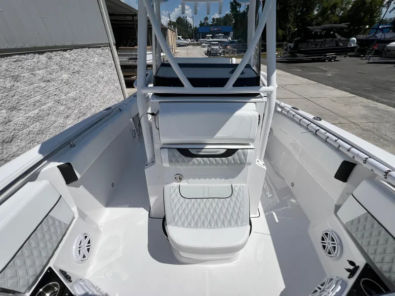 Slide: The Image of 2024 Blackfin 252 CC boat interior with seating and storage compartments. - 8