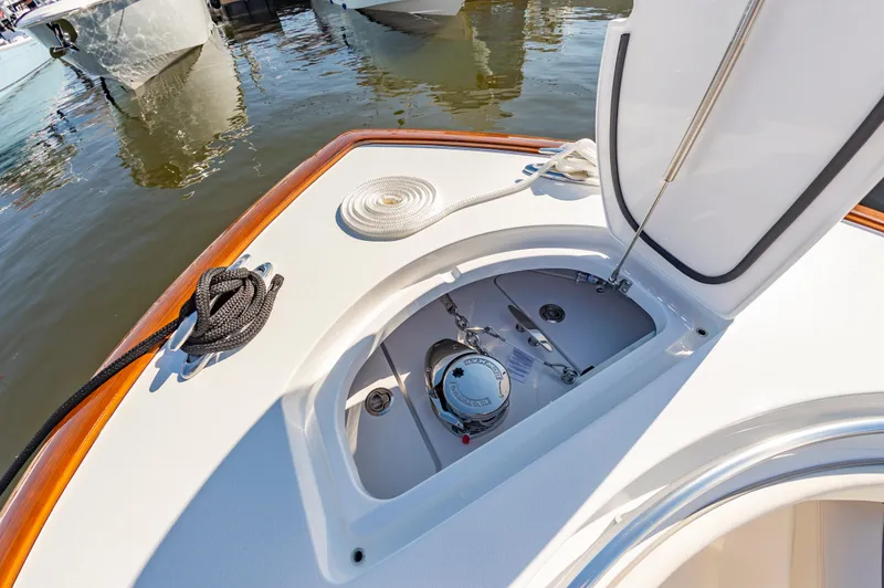 Slide: The Image of 2025 Valhalla Boatworks V-29 deck with open hatch and marine equipment. - 28