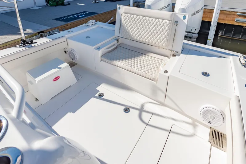 Slide: The Image of 2025 Valhalla Boatworks V-29 interior with cushioned seating and modern design. - 32