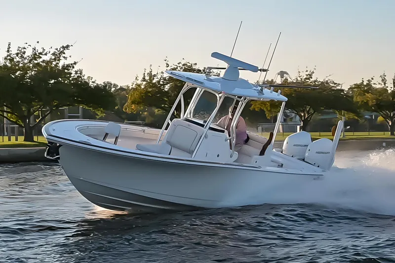 Slide: The Image of 2025 Valhalla Boatworks V-29 cruising on water at sunset. - 5