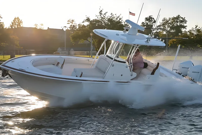 Slide: The Image of 2025 Valhalla Boatworks V-29 cruising on water at sunset. - 6