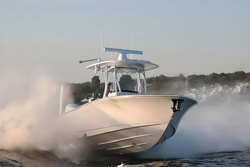 Slide: The Image of 2025 Valhalla Boatworks V-29 cruising on water, creating a dynamic splash. - 7