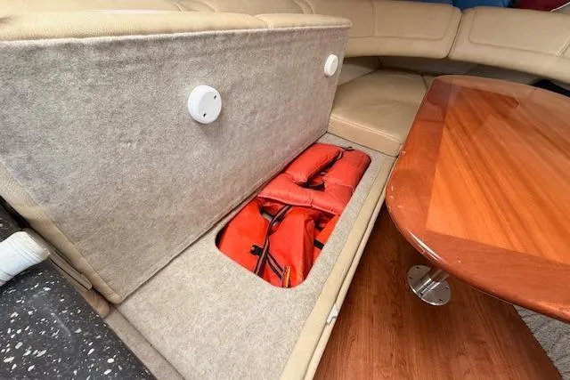 Slide: The Image of 2008 Formula 350 Sun Sport interior with storage compartment and life jackets. - 28