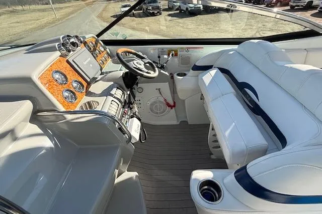 Slide: The Image of 2008 Formula 350 Sun Sport boat interior with sleek dashboard and white seating. - 37