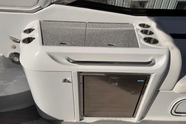 Slide: The Image of 2008 Formula 350 Sun Sport boat kitchenette with storage and cup holders. - 39