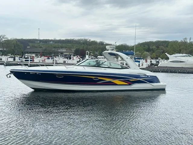 Slide: The Image of 2008 Formula 350 Sun Sport boat docked in harbor. - 4