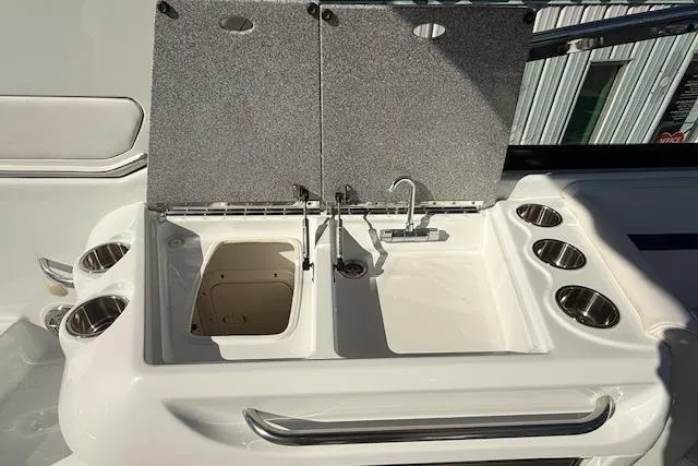 Slide: The Image of 2008 Formula 350 Sun Sport boat sink and cup holders on deck. - 40