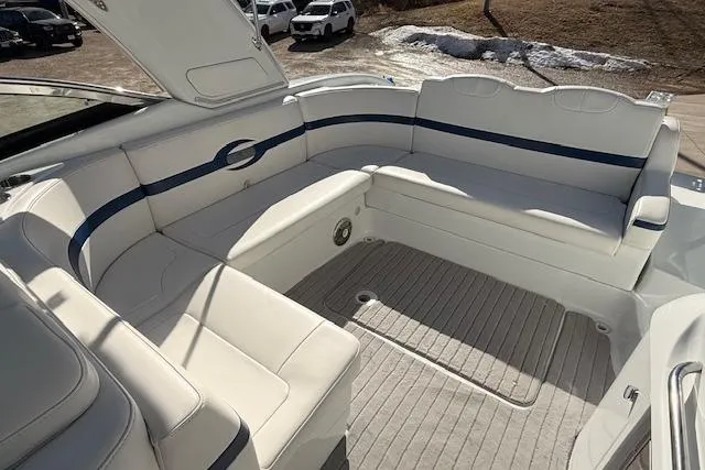 Slide: The Image of 2008 Formula 350 Sun Sport boat interior with white seating and blue accents. - 41
