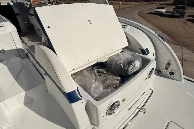 Slide: The Image of 2008 Formula 350 Sun Sport boat with open storage compartment on deck. - 45