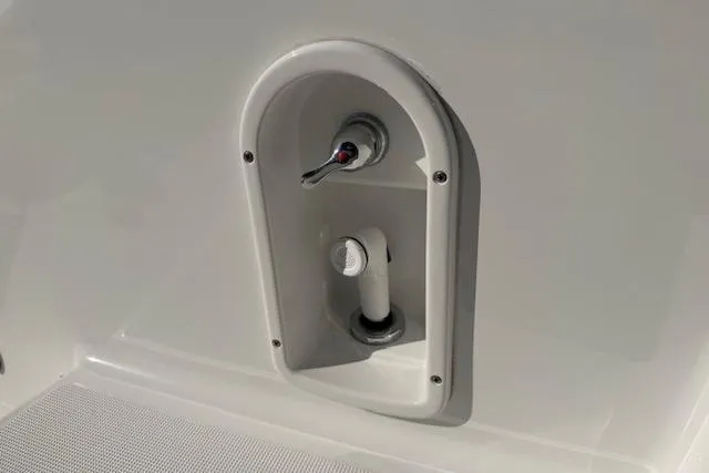 Slide: The Image of 2008 Formula 350 Sun Sport boat shower fixture, white enclosure, close-up view. - 49