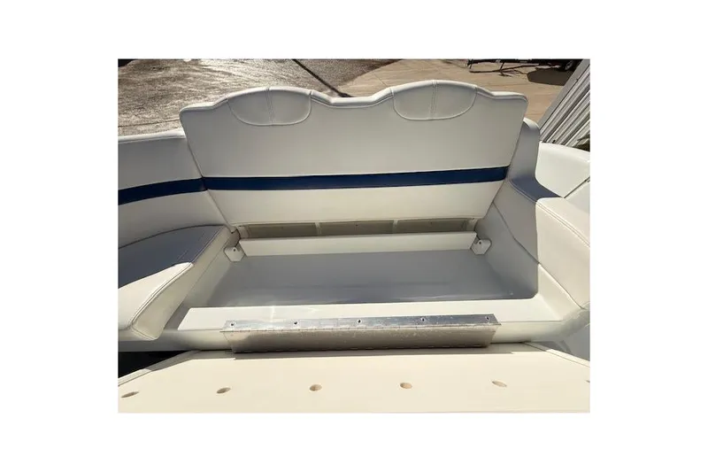 Slide: The Image of 2008 Formula 350 Sun Sport boat seating area with white and blue upholstery. - 53