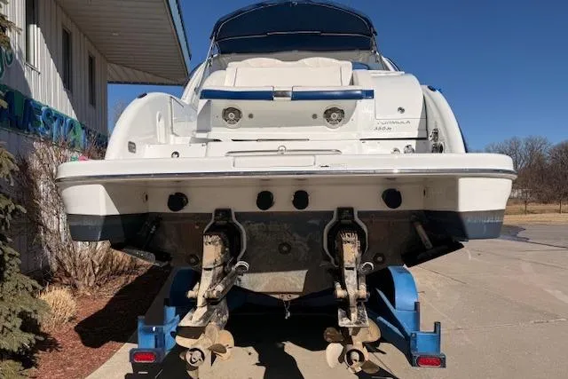 Slide: The Image of 2008 Formula 350 Sun Sport boat on trailer, rear view, outdoors. - 56