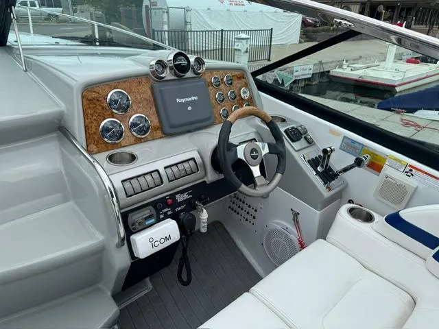Slide: The Image of Cockpit of a 2008 Formula 350 Sun Sport boat with steering and instruments. - 7