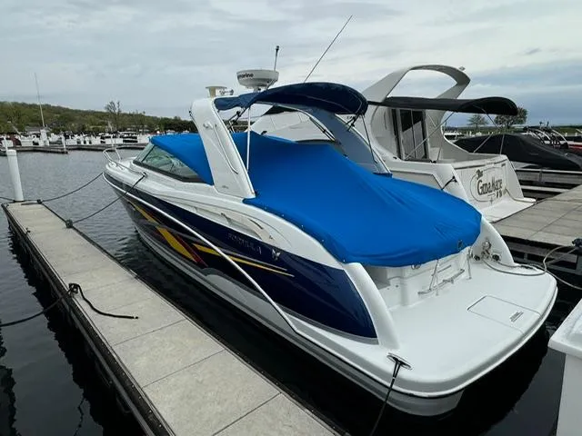 Slide: The Image of 2008 Formula 350 Sun Sport boat docked at marina. - 9