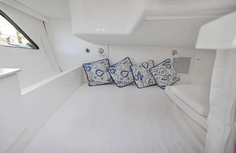 Slide: The Image of Interior cabin of 2016 Intrepid 400 Cuddy with patterned cushions. - 24