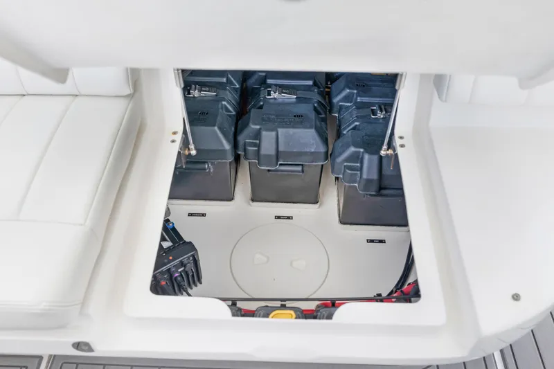 Slide: The Image of 2016 Intrepid 400 Cuddy battery compartment with three batteries. - 28