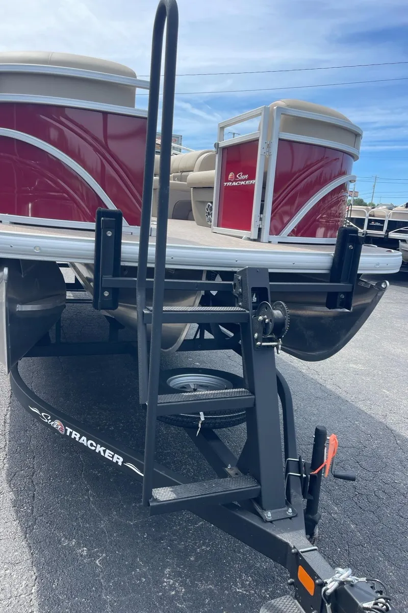 Slide: The Image of 2024 Sun Tracker Party Barge 22 RF XP3 pontoon boat on trailer. - 11