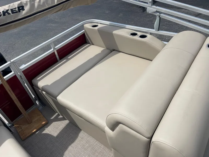 Slide: The Image of 2024 Sun Tracker Party Barge 22 RF XP3 beige seating area with cup holders. - 7