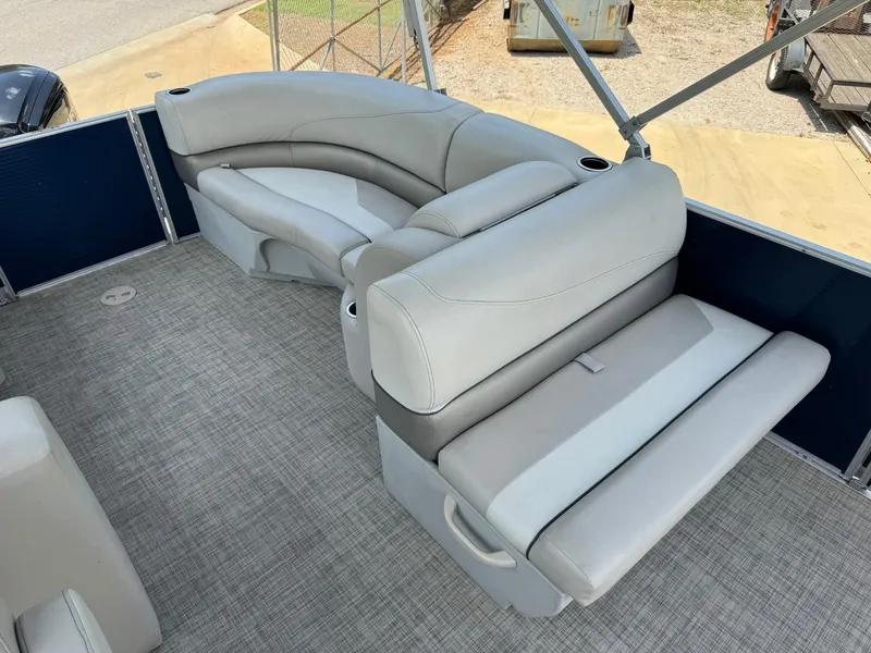 Slide: The Image of 2022 Cypress Cay Seabreeze 232 pontoon boat with spacious seating and modern interior. - 5