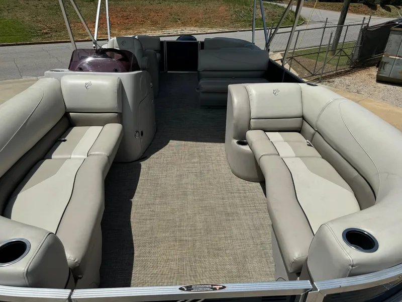 Slide: The Image of 2022 Cypress Cay Seabreeze 232 pontoon boat with spacious seating and modern design. - 9