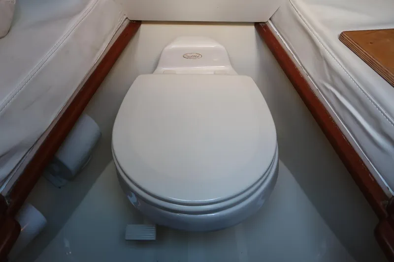 Slide: The Image of Toilet in 2004 Hinckley Talaria 29 Runabout boat interior. - 21