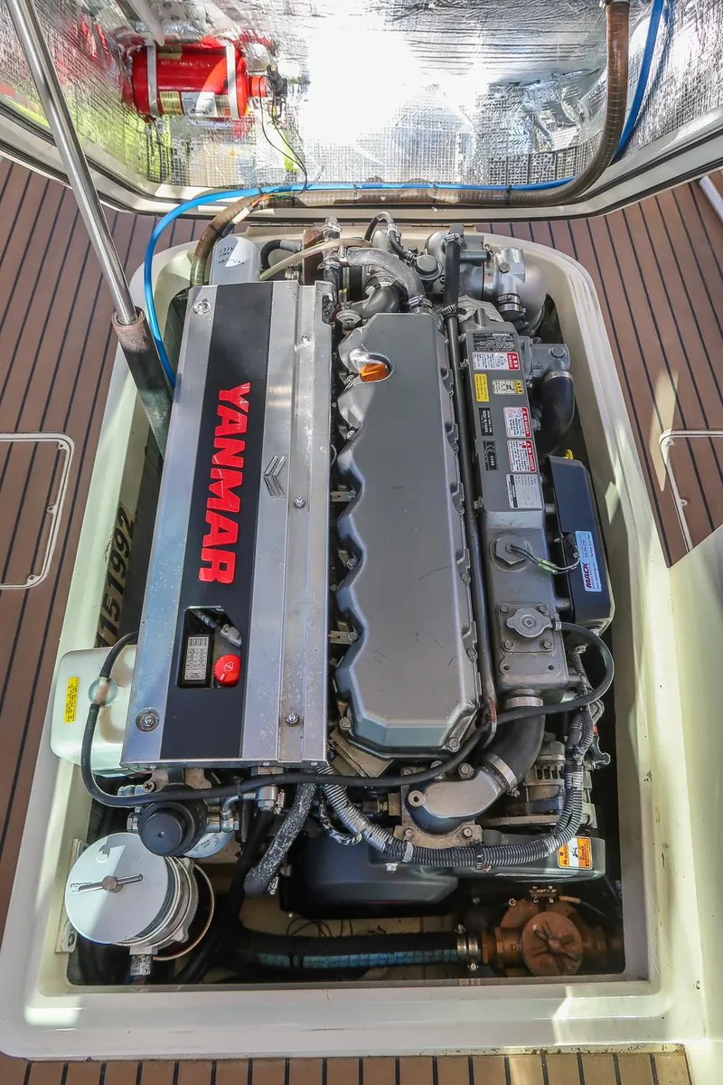 Slide: The Image of Yanmar engine in a 2004 Hinckley Talaria 29 Runabout, showcasing detailed mechanical components. - 26