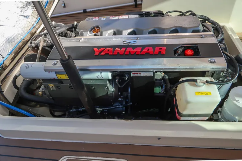 Slide: The Image of Yanmar engine in a 2004 Hinckley Talaria 29 Runabout boat. - 27
