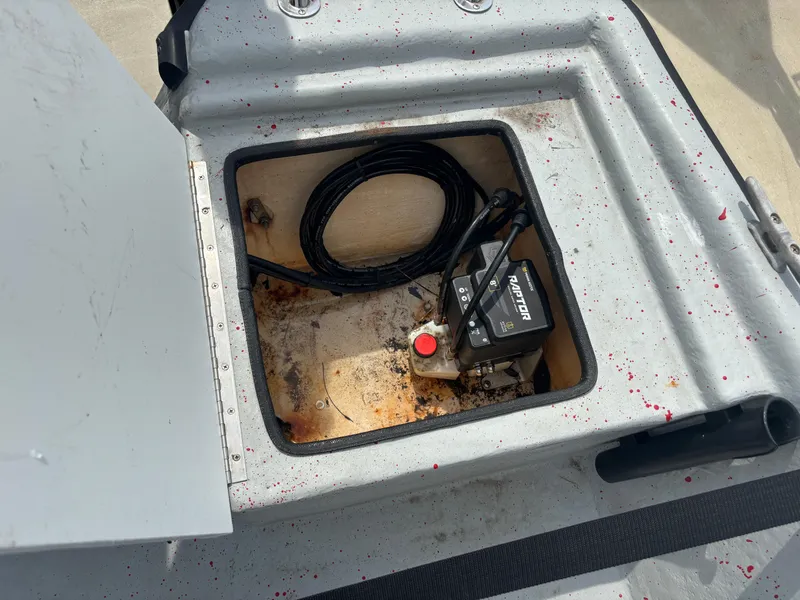 Slide: The Image of Open storage compartment on 1997 Hydra-Sports 21 boat with wiring and equipment. - 15