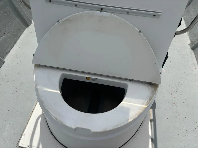 Slide: The Image of Boat toilet on a 1997 Hydra-Sports 21 model. - 21