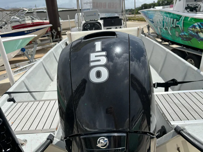 Slide: The Image of 1997 Hydra-Sports 21 boat with 150 horsepower engine, docked at marina. - 3