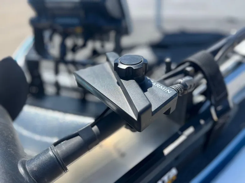 Slide: The Image of 2020 Triton 21 TRXS boat interior with Garmin navigation system. - 14