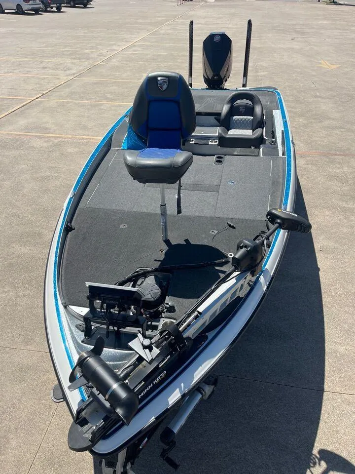 Slide: The Image of 2020 Triton 21 TRXS boat with Garmin navigation system and Minn Kota trolling motor. - 30