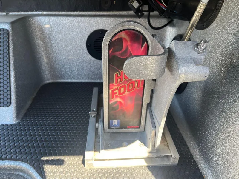 Slide: The Image of 2020 Triton 21 TRXS boat interior with dual seats and storage compartments. - 32