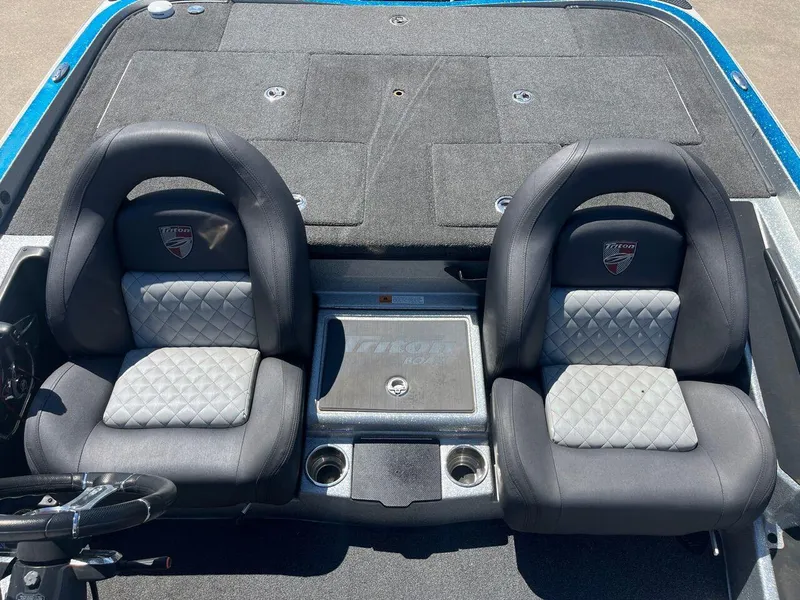 Slide: The Image of 2020 Triton 21 TRXS storage compartment. - 35