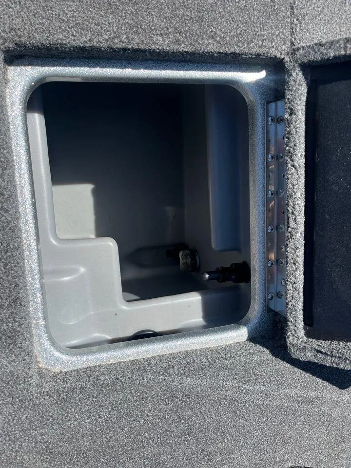 Slide: The Image of Close-up of Pro-Trim control on 2020 Triton 21 TRXS boat dashboard. - 38