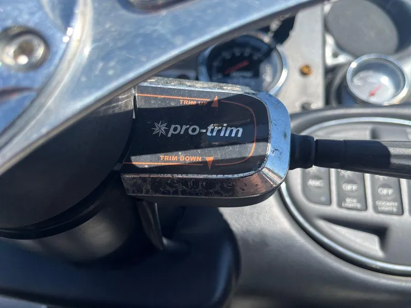 Slide: The Image of 2020 Triton 21 TRXS boat trailer with dual black alloy wheels. - 41