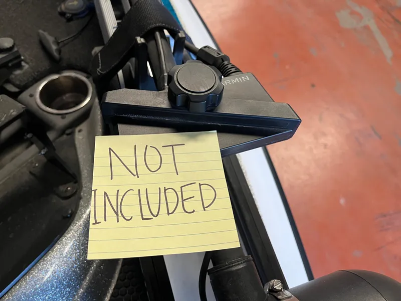 Slide: The Image of 2020 Triton 21 TRXS bass boat on trailer in parking lot. - 5