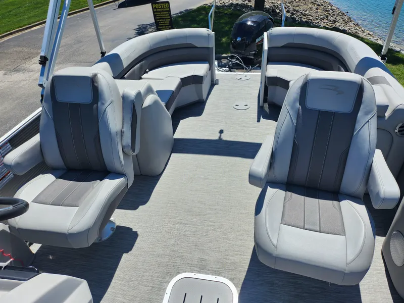 Slide: The Image of 2020 Bennington SX 22 SSRCX pontoon boat interior with plush seating. - 12