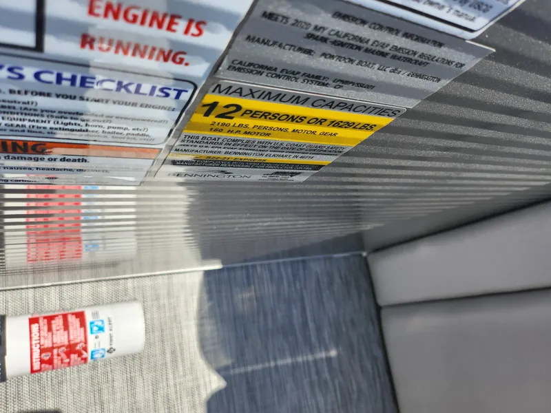 Slide: The Image of Bennington SX 22 SSRCX 2020 boat capacity label, maximum 12 persons or 1632 lbs. - 18
