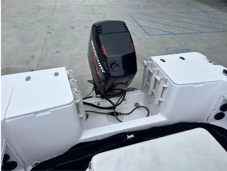 Slide: The Image of 1999 Pro-Line 170CC boat with Mercury 125 outboard motor. - 11