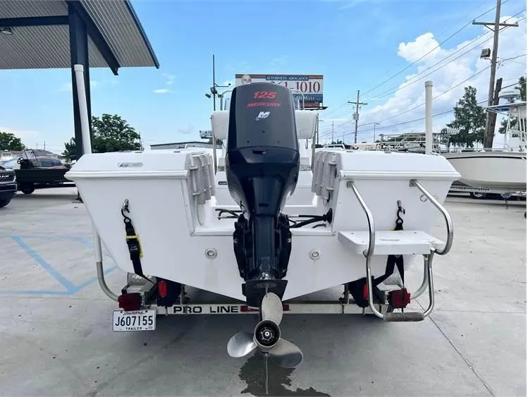 Slide: The Image of 1999 Pro-Line 170CC boat with Mercury 125 outboard motor, rear view. - 12