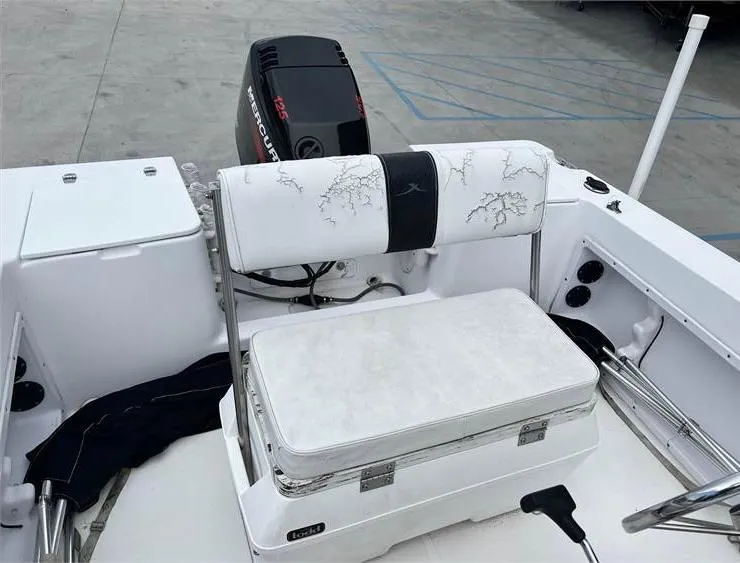 Slide: The Image of 1999 Pro-Line 170CC boat interior with Mercury outboard motor. - 9